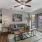 living room with easy access to patio doors and a hallway