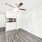 Entryway showcasing the kitchen bar and built in shelving