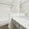 Spacious bathroom with bedroom & hallway entry