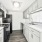 Renovated kitchen with black appliance package